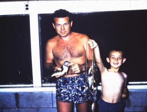 Dad and me with fish