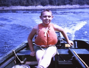 Me age 12 running the boat